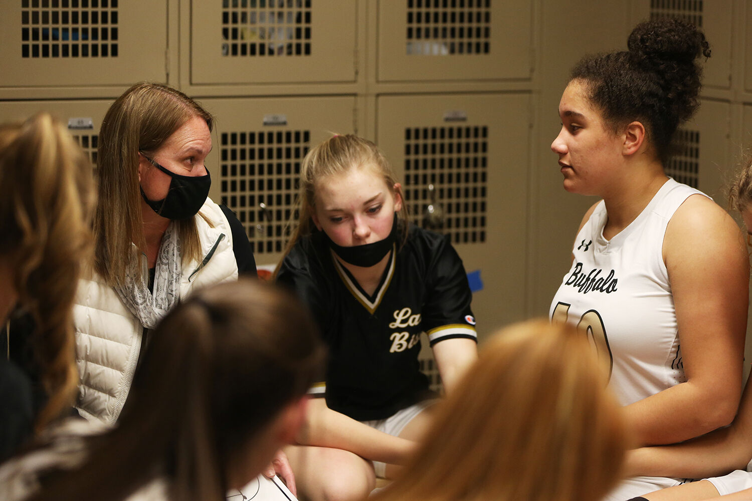 Michelle Dahlberg answers a question from junior Danica Boyce during half time
